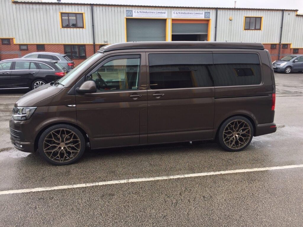 Van parked near industrial buildings