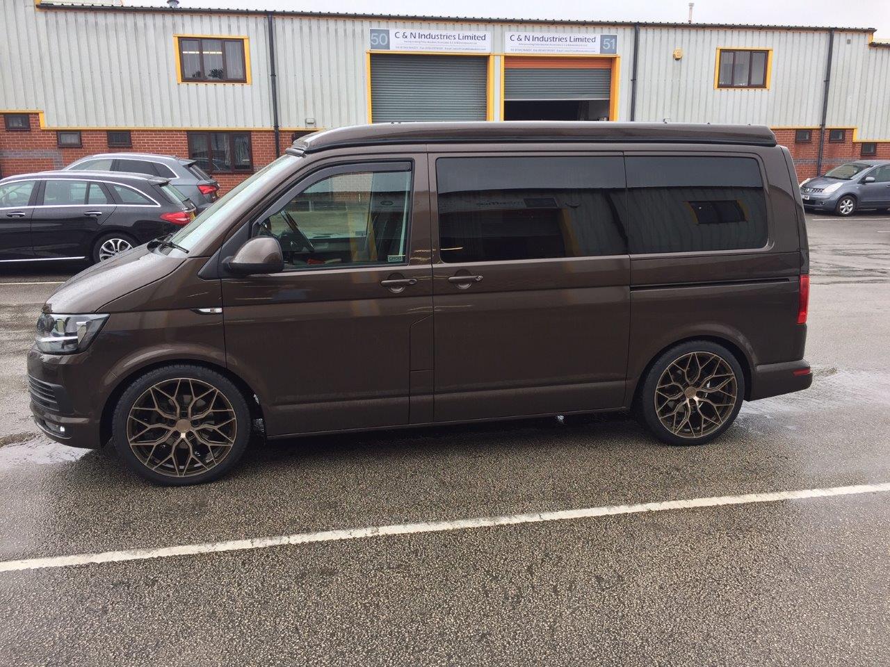 Brown vehicle in commercial area
